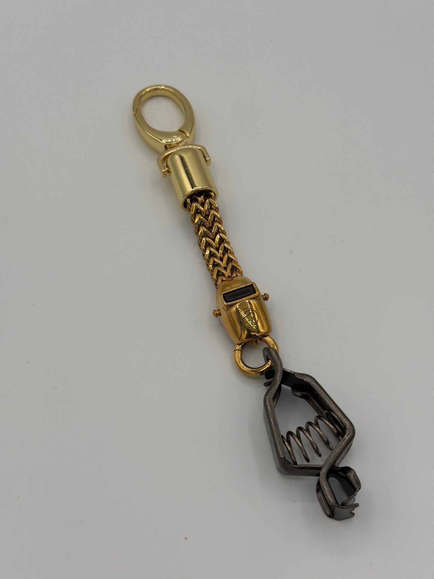 Gold welding hood clove clip